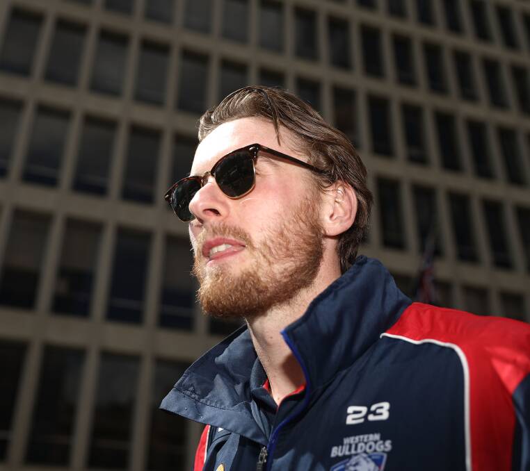 TAKING IT ALL IN: Roughead enjoys the atmosphere at Friday's traditional AFL grand final parade along the streets of Melbourne. Picture: Getty Images.