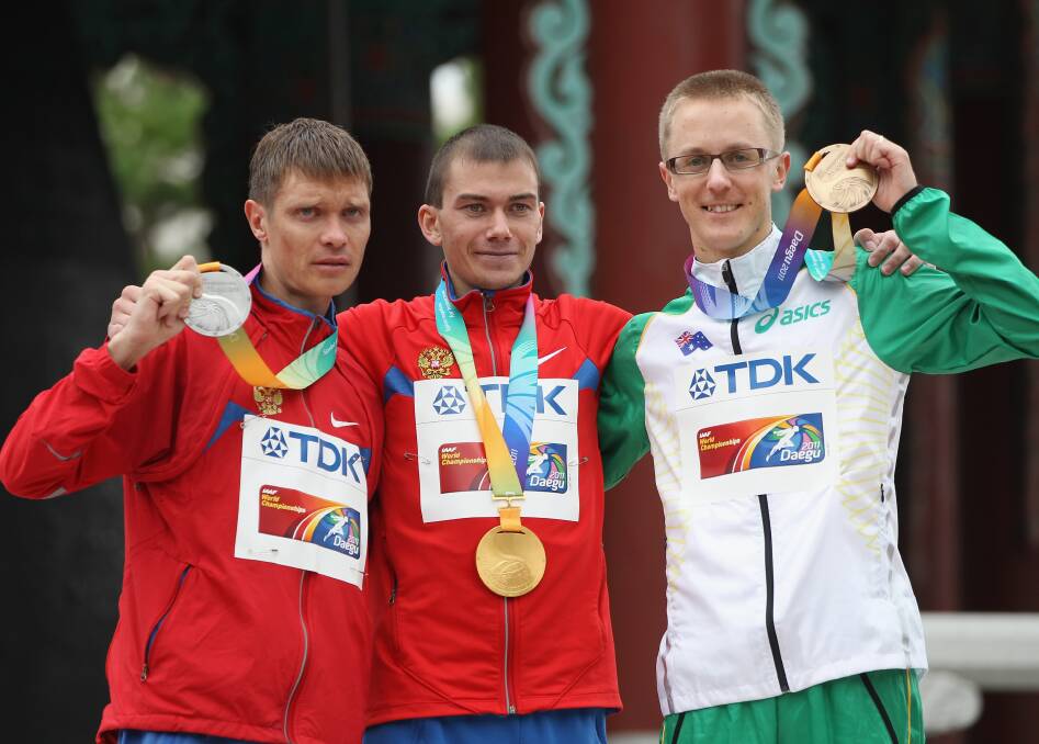 CHASING GOLD: Jared Tallent alongside Sergey Bakulin (centre) and Denis Nizhegorodov (left) in 2011. Picture: Getty Images.