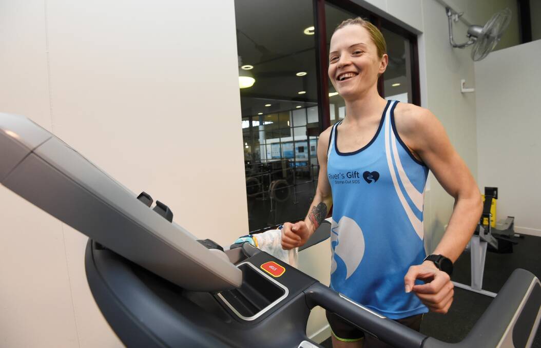 READY TO GO: Tash Fraser warms up for her world record attempt on Friday at the Ballarat Aquatic and Lifestyle Centre. Picture: Lachlan Bence.