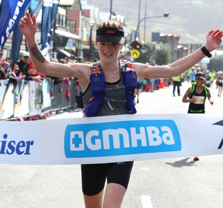 CHAMPION: Tash Fraser crosses the line to win the women's section of the ultra marathon on Sunday. Picture: SuperSport Images.