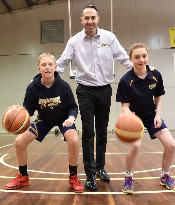 TAKING CHARGE: Nathan Cooper-Brown will help guide young players like Tom Foley and Brydi Hutchinson in his new three-year position with Ballarat Basketball. Picture: Lachlan Bence.