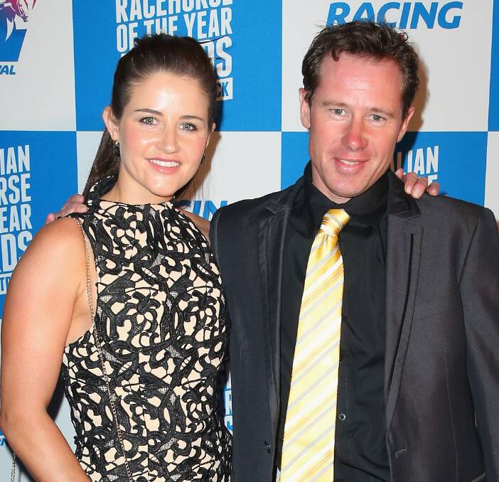 FAMILY: Patrick Payne, pictured with Michelle at an industry function during 2014, has expressed a desire for his sister to retire from riding. Picture: Getty Images.