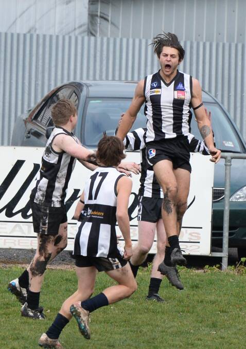 YOU BEAUTY: Clunes' Jesse Baird celebrates a goal during Saturday's 16-point victory over Rokewood-Corindhap. Picture: Kate Healy.