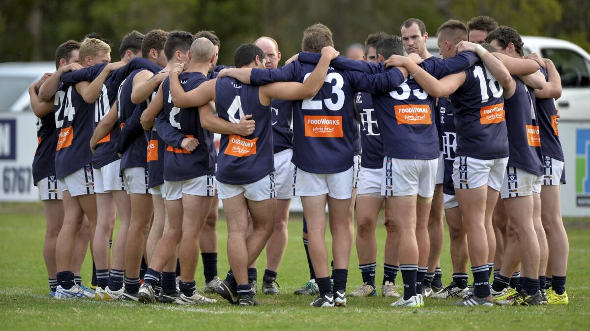 BLUES BOYS: Ballan prevailed by three points in the clash with Learmonth on Saturday. Picture: Dylan Burns.