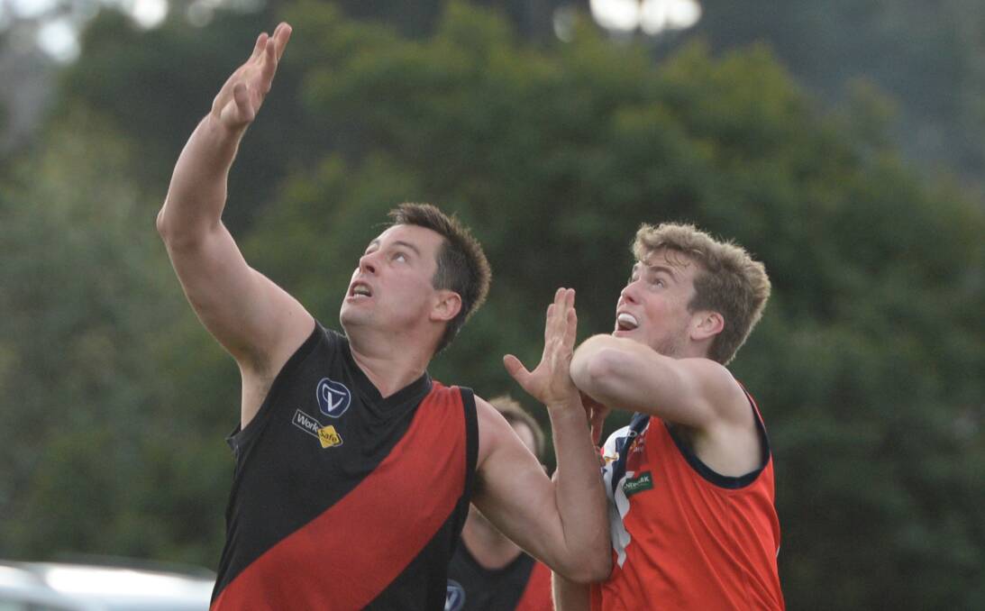 FROM A SAINT TO A BOMBER: Former St Kilda player Chris Oliver (left) has enjoyed his year with Buninyong. Picture: Kate Healy.