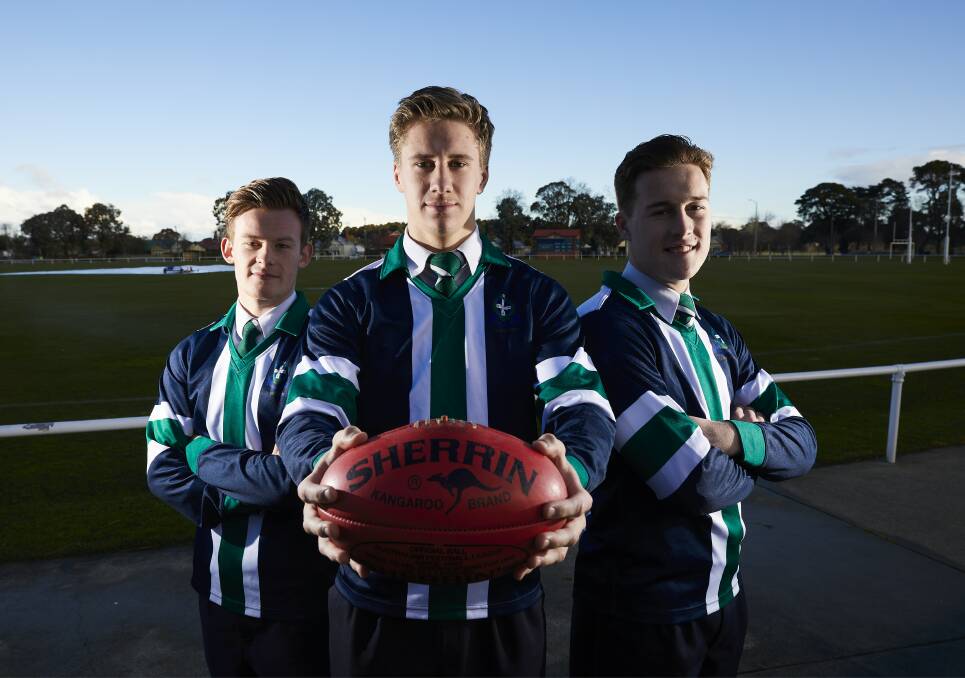 HOSTS: St Patrick's College students Joe Dodd, Jordan Johnston and Mitch Tuddenham are looking forward to a round of the AFL International Cup at their school on Wednesday. Picture: Luka Kauzlaric.