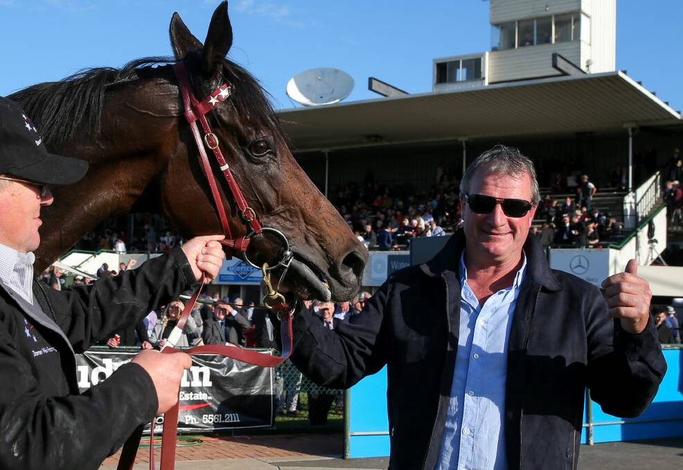 STARS: Darren Weir with High Church after his win in the Warrnambool Cup.