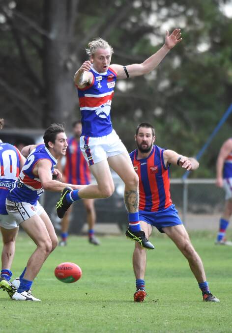 HIGH FLY: Daylesford's Zac Tisdale in action on Saturday. Picture: Lachlan Bence.