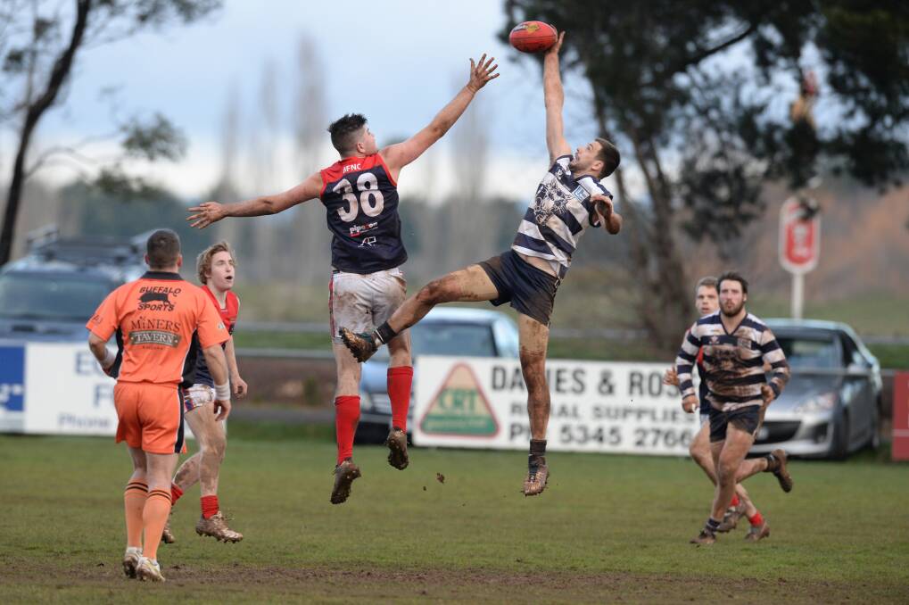 FLY: Oliver Hayes (Bungaree) and Jarrod Fryar (Newlyn) during a ruck contest on Saturday. Picture: Kate Healy.