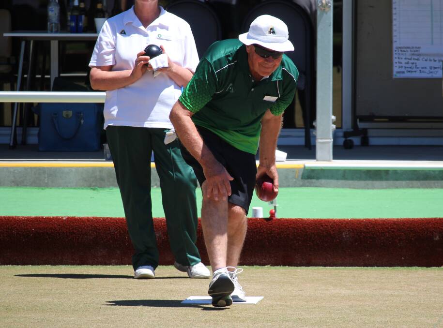 LEFT-HANDED: Host club bowler Ian Voigt is pictured in action during the annual triples event at Buninyong, which saw more than 40 players take part.