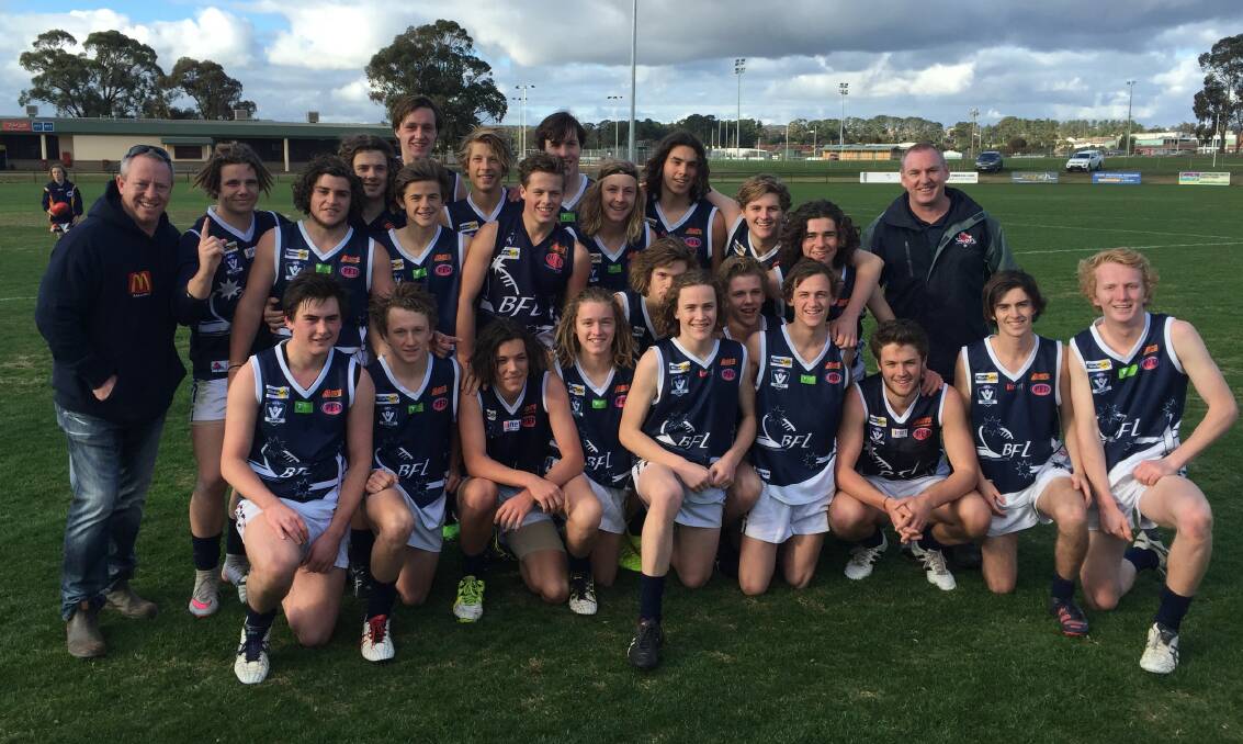 VICTORY POSE: The Ballarat under-16 team after its victory against Riddell District on Saturday at Northern Oval 2. The result helped the BFNL retain the shield.