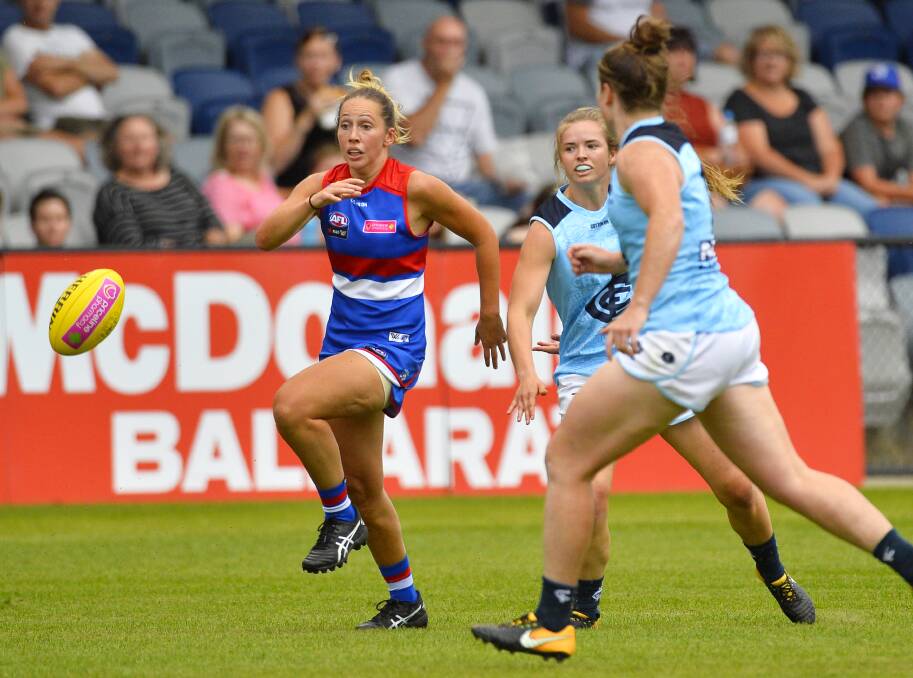 BACK HOME: Former Ballarat girl Laura Bailey looks to pick up possession for the Western Bulldogs, which lost to Carlton by 16 points. Pictures: Dylan Burns.