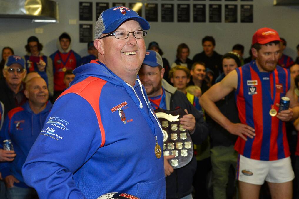 ALL SMILES: Hepburn coach Jason Olver speaks to his players and club supporters after the match. Pictures: Dylan Burns.