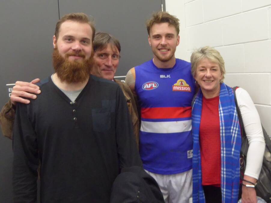FAMILY: Brother Joel, father Paul and mother Bernie pose for a photo with Jordan (second from right) after his 100th AFL match in Adelaide earlier this season.
