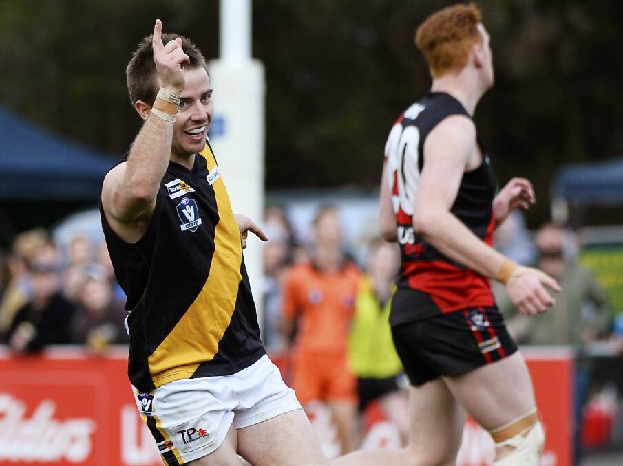 NUMBER ONE: Tyler George celebrates during the Tigers' win over Buninyong on Saturday. George kicked two goals. Pictures: Luka Kauzlaric, Dylan Burns.