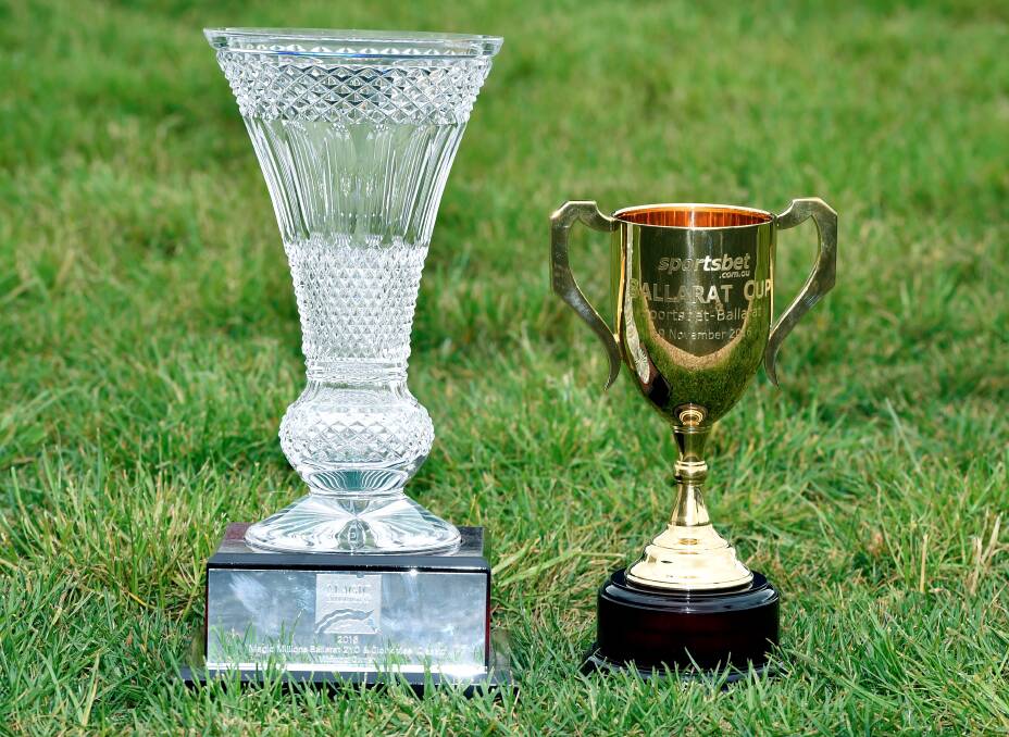 The Magic Millions trophy (left) from 2016 sits next to the Ballarat Cup.