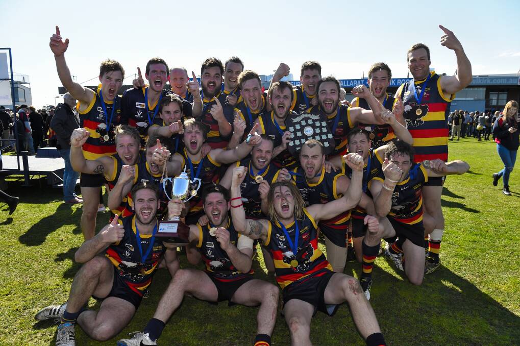 HAPPY DAYS: The Beaufort boys celebrate the reserves premiership success in 2015. The Crows beat Buninyong in that game and meet the Bombers again this Saturday.
