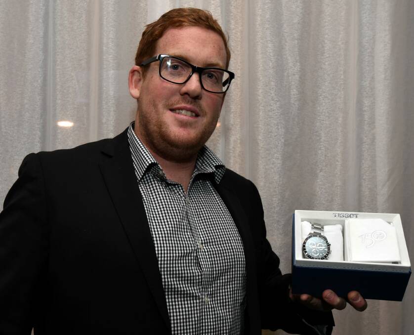 COACH AND TEAMMATE: Rokewood-Corindhap coach Jarrod Thompson with the watch Sam Chapman receives as The Courier player of the year. Picture: Lachlan Bence.