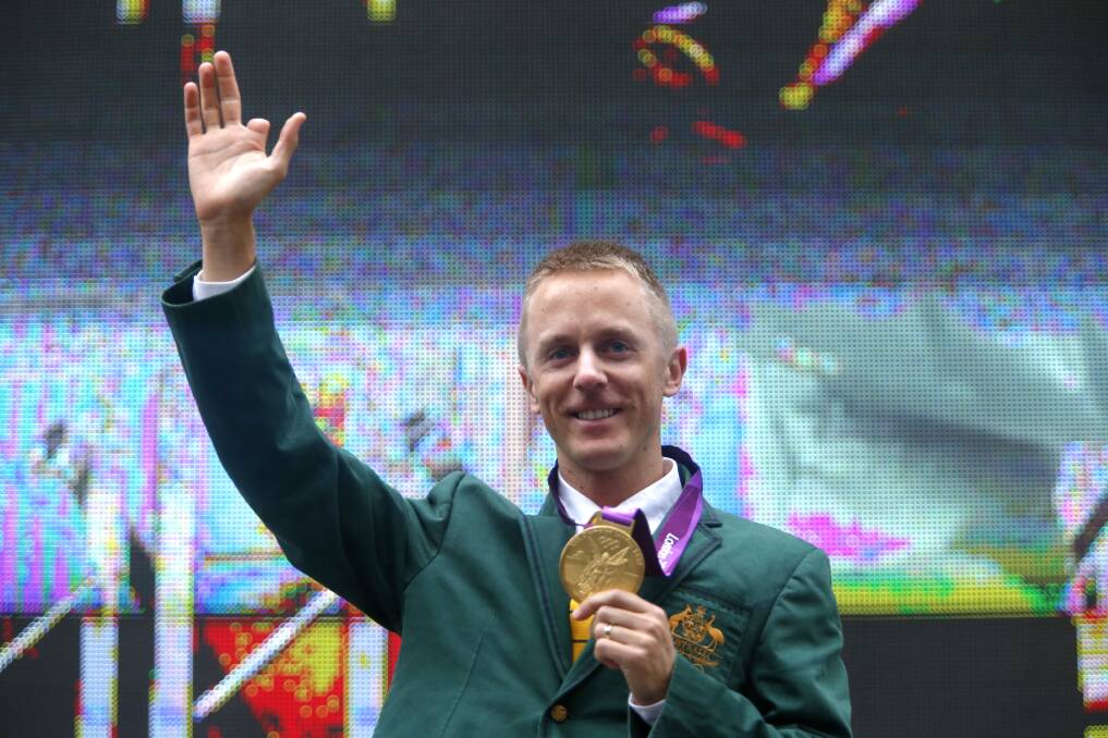 HAPPIER TIMES: Jared Tallent is pictured at the Olympic gold medal ceremony in Melbourne during 2016. Here, he was presented with a retrospective medal for victory in the 50km walk at the 2012 London Olympic Games.