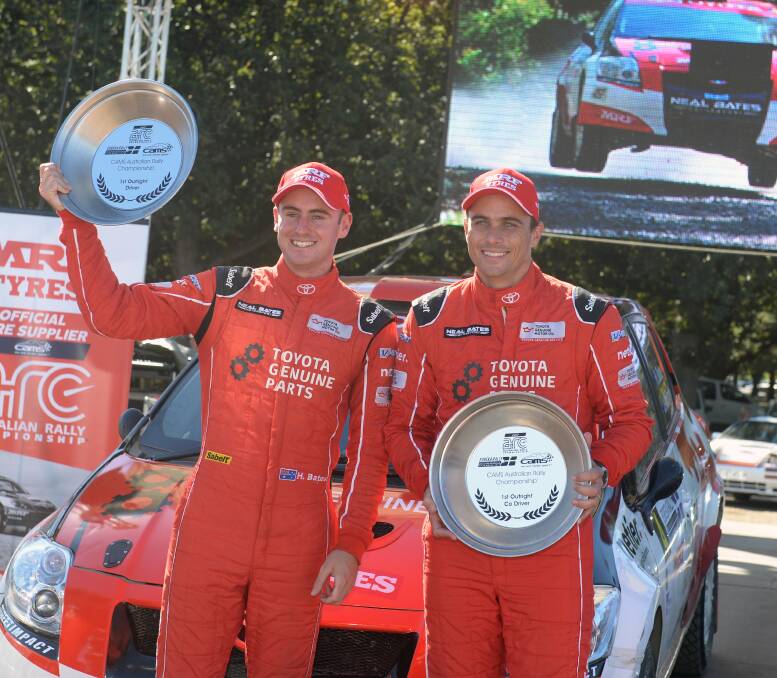WINNERS: Harry Bates and John McCarthy celebrate last year's victory in the Eureka Rally.