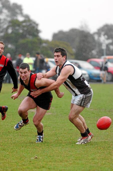EYEING A RETURN: Ash Carli (left), pictured playing for Buninyong in 2009, is hoping to be cleared from a life ban and return to the field for Smythesdale this season.