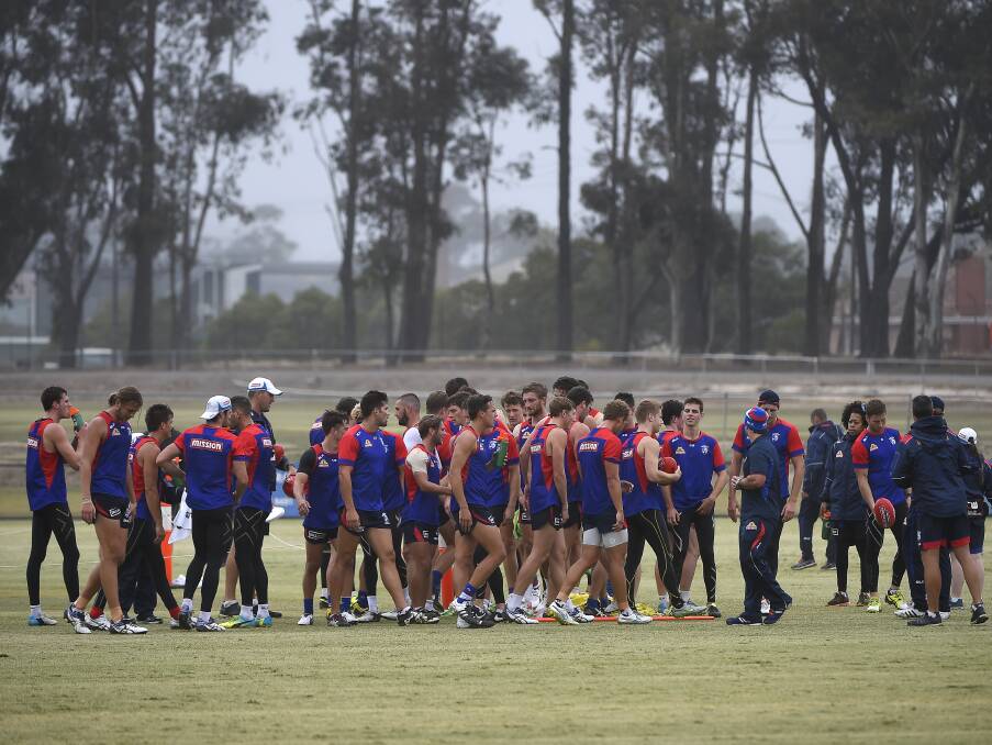 TEAM WORK: Western Bulldogs players and support staff during the club's hit-out, which was part of the two-day community camp in Ballarat.