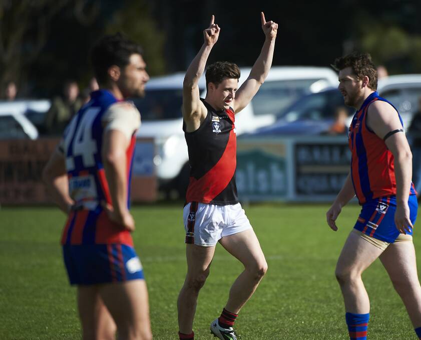 HAPPY TIMES: Buninyong's Fraser Russell celebrates a goal during the preliminary final against Hepburn. Russell was named in the Bombers' best.
