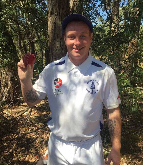 Aled Carey shows off the match ball he used to claim six wickets in an over.