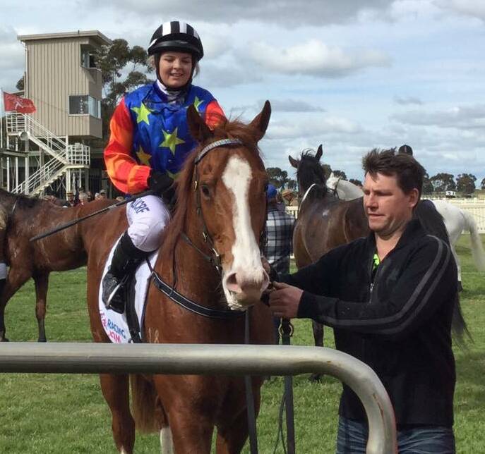 MEMORABLE: Ballarat jockey Leticia Griffin returns to scale after winning aboard Captain Crackerjak, strapped by Damian Hanrahan. Picture: Dan O'Sullivan Racing.