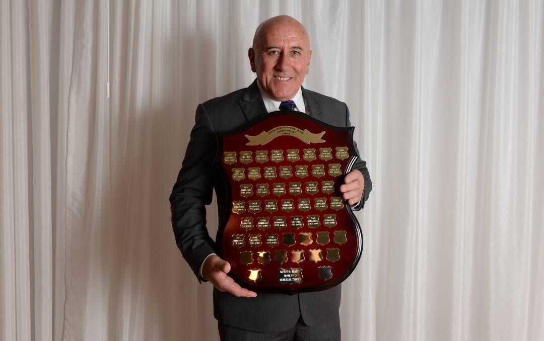 PROUD: Buninyong president Andrew Donald with the Merv and Mary Howard Memorial Trophy. Picture: Kate Healy.