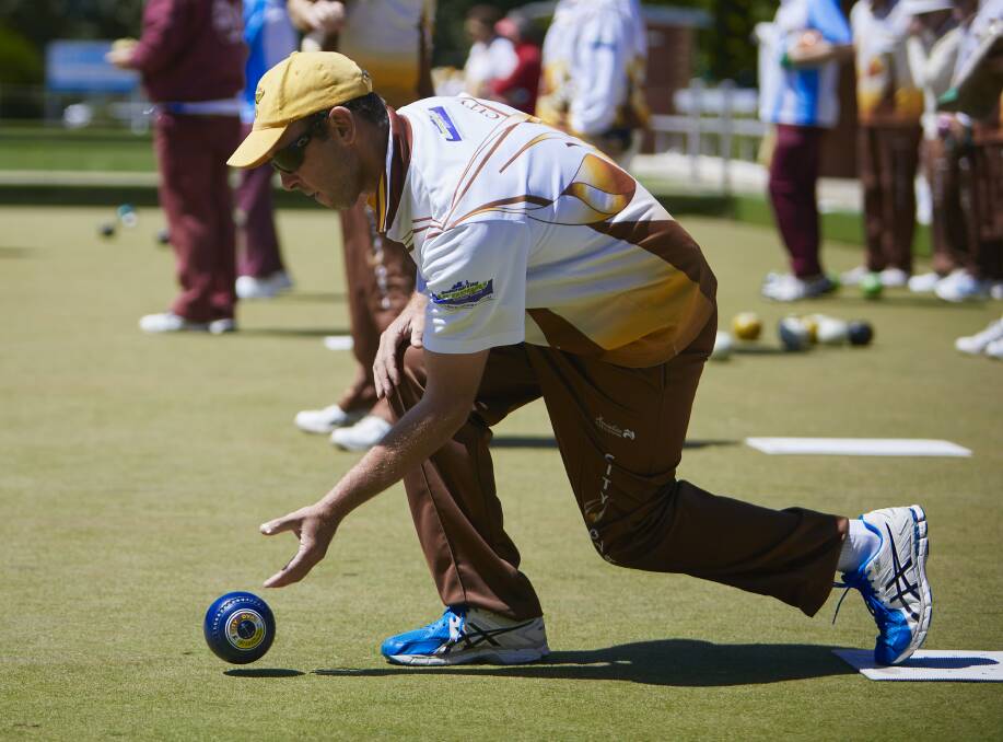 LEFT HANDER: Ben Morris shows his style during City Oval's clash with Bareena. Morris was part of Callum Mann's rink which collected a victory.