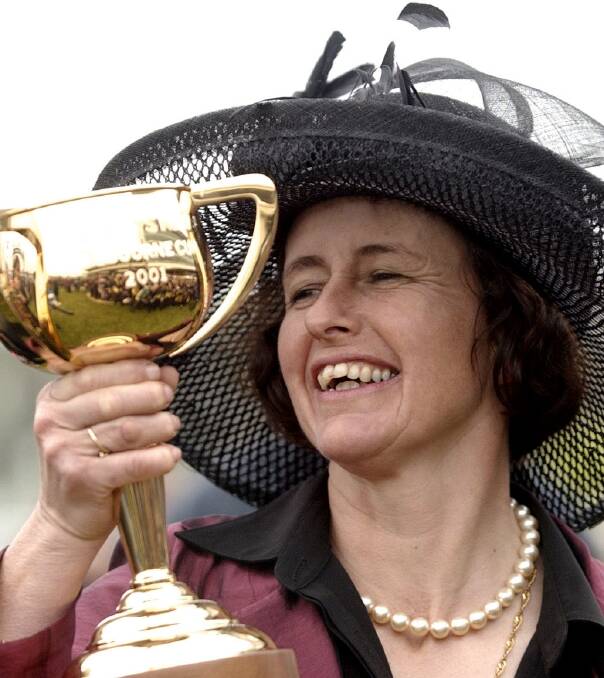 JOY: Sheila Laxon, pictured in 2001 holding the Melbourne Cup she won with Ethereal, might have a runner in the 2016 Ballarat Cup. Picture: Getty Images.