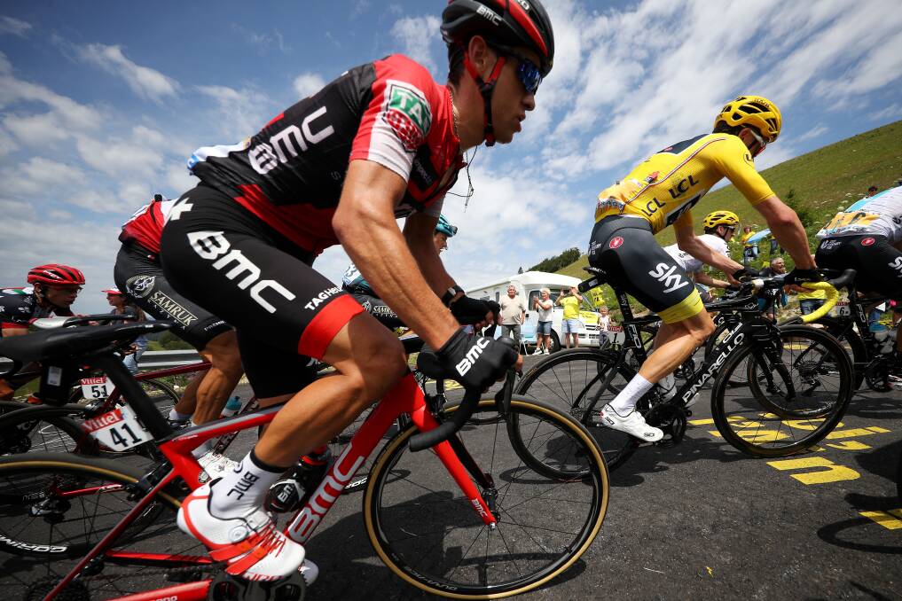 DETERMINED: Australia's Richie Porte hot on the wheels of Tour favourite Chris Froome in the peloton during stage nine before crashing out in France earlier this week. Picture: Getty Images