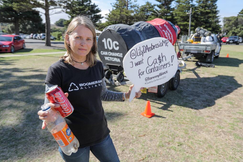 BIG BOTTLE TOUR: Boomerang Allience member Annett Finger brought the big bottle to Warrnambool as part of acampaign for a container deposit scheme in Victoria. The team will travel to Ballarat on April 12. Picture: Rob Gunstone