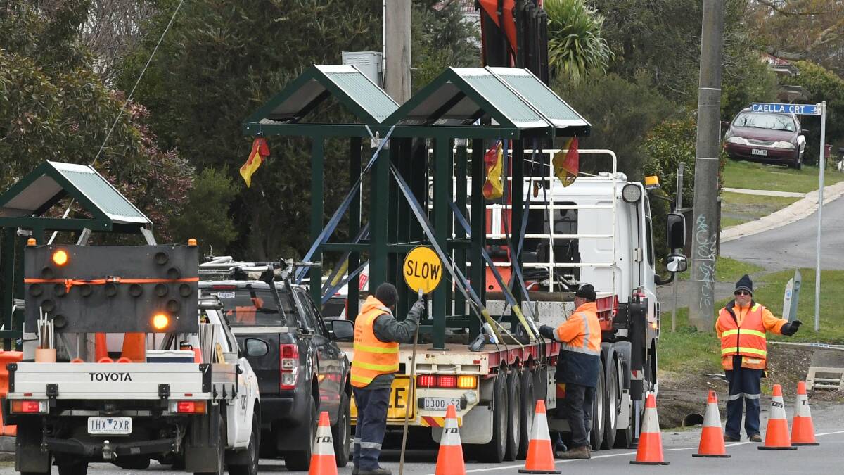 Bus shelters were being constructed on Main Road on Friday. Picture: Lachlan Bence