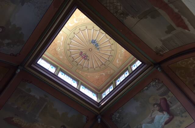 The restored painted ceiling of Reid's Guest House.