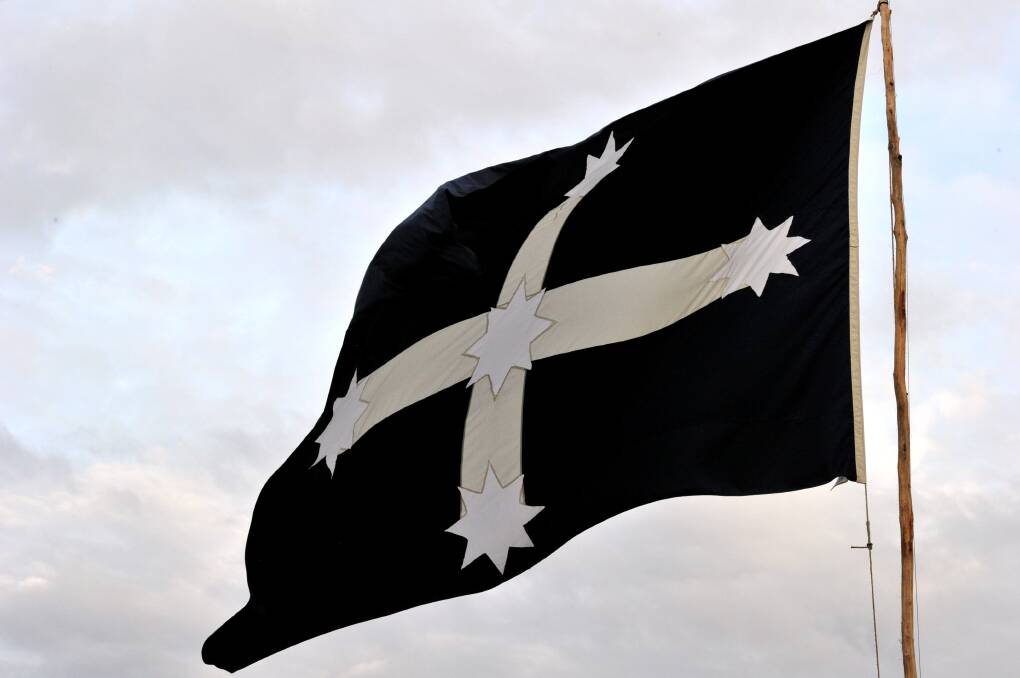 A far-right political party from New South Wales has won the right to use the Eureka flag as its emblem. The hand-sewn Eureka Flag flies on a rough hewn flag pole during 2014 celebrations. 