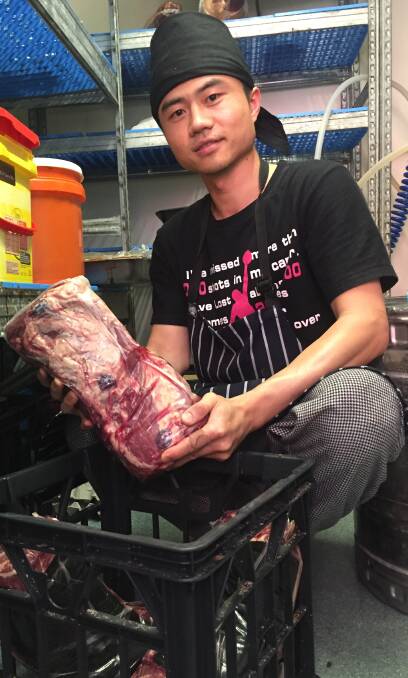 Steak: Royal Mail Hotel head chef Paul Zhu with a slab of meat similar to the steaks stolen from the pub's cool room on Christmas Eve. Picture: Jessica Black.