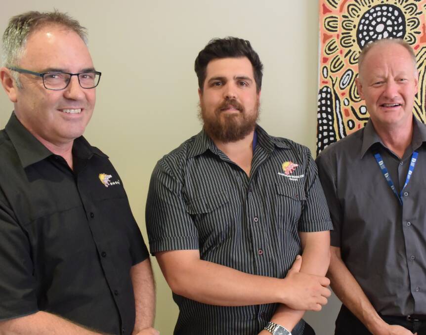 HELPING: Ballarat and District Aboriginal Co-op mental health nurses Peter Treloar and  Kelvin Wilson and practice nurse Anthony Harrison (centre).