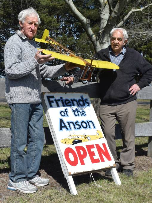 Flight delight: Anson Museum curator Alan Penhall (right) with volunteer Dave Lacy who has created a model version of the first plane to fly in Ballarat. Picture: Sam Shalders