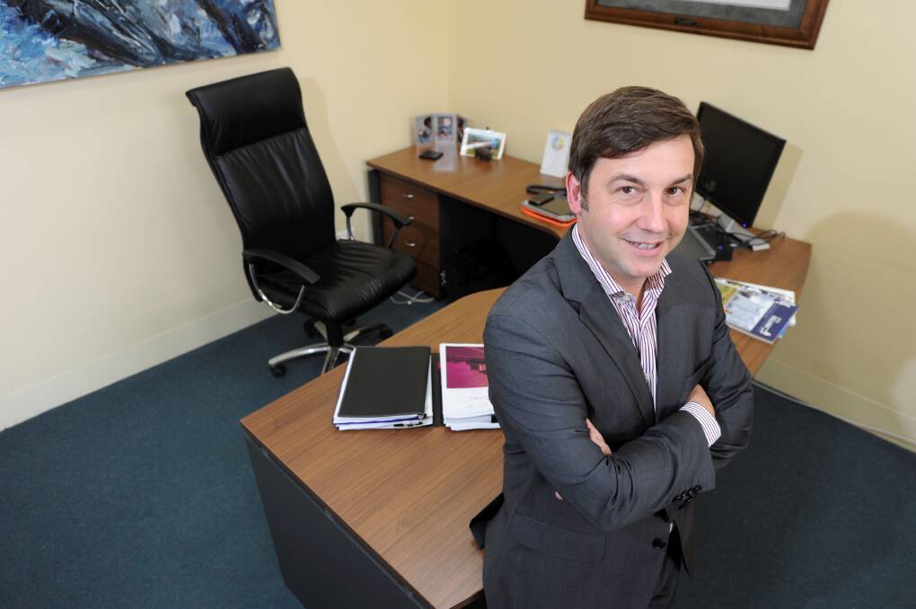 VOTE TO COME: City of Ballarat chief executive officer Anthony Schink at his desk in 2012. An in-camera vote on Wednesday will decide the future of the role.