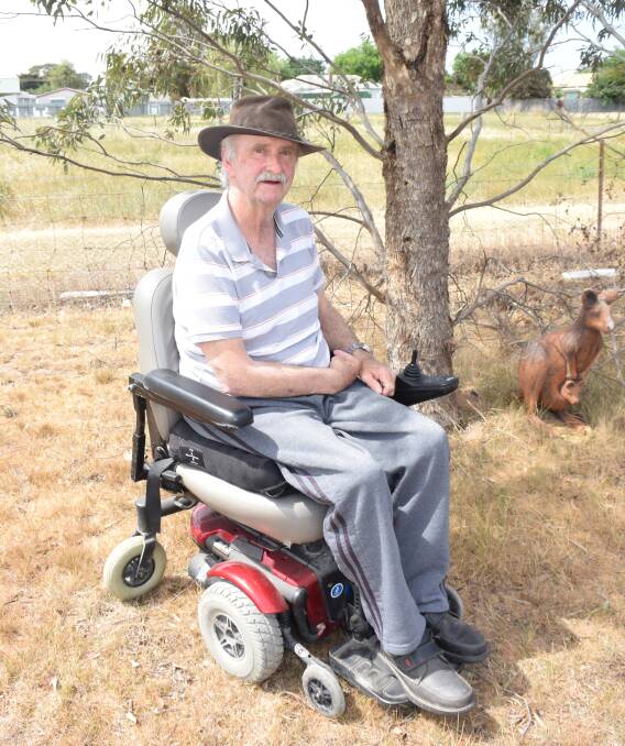 Resting easy: John Condon is hoping he will soon be able to catch the bus from Clunes to Ballarat in his mobility scooter without any issues, following a scheduled meeting on Monday with V/Line officials. Picture: Sam Shalders 