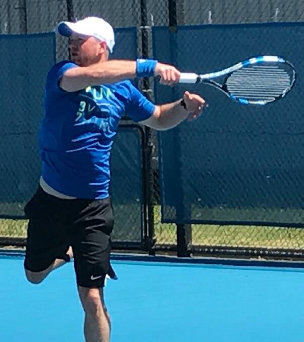 James Millikan goes for a big forehand against his brother Hugh in the Ballarat regional tennis men’s open singles final.