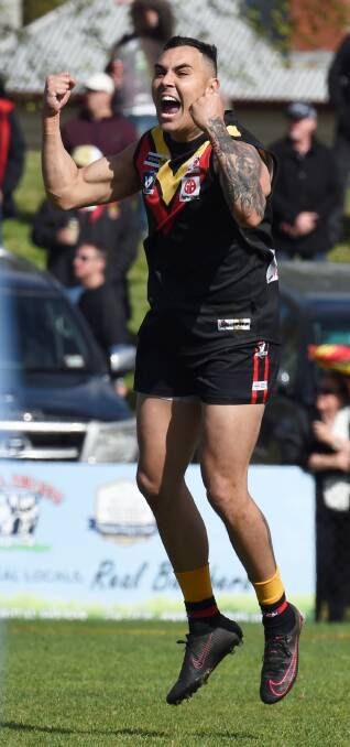 JUMPING FOR JOY: Bacchus Marsh excitement machine Jarrah Maksymow celebrates one of his four goals. Pictures: Lachlan Bence