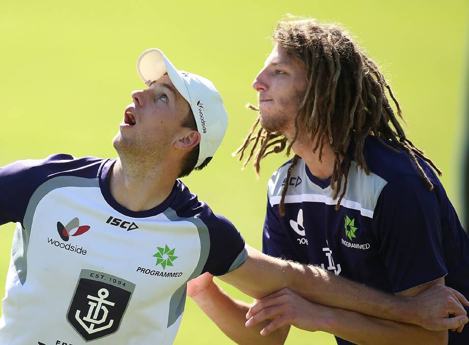 PAST LIFER: Ballarat Miners recruit Craig Moller, right, grapples with Jack Hannath at a Fremantle Dockers training during last year's AFL finals series. Picture: Getty Images
