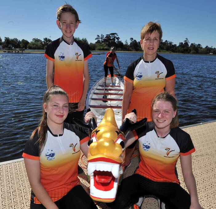 BIG TIME: National representatives Michelle Donaldson, Abby Spedding and Jules Matthews with Golden Dragons club president Helen Payne and Maggie Guy (back). Picture: Lachlan Bence