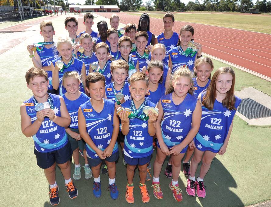 STATE HOPEFULS: Regional track and field medallists and members of the Ballarat contingent off to the state little aths titles. Picture: Lachlan Bence