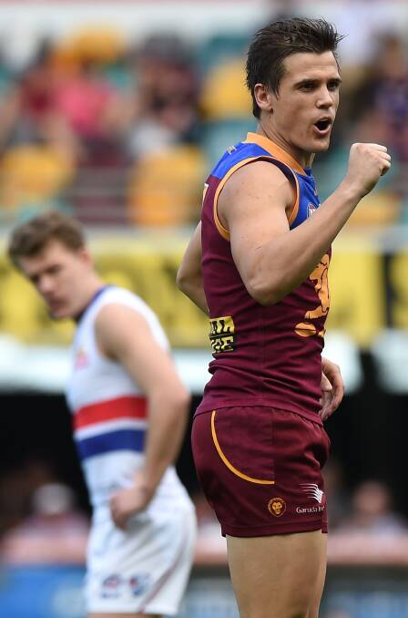 NEW HOME: Jed Adcock pumped up in his last game for the Brisbane Lions, which was ironically against his new club Western Bulldogs. Picture: Getty Images