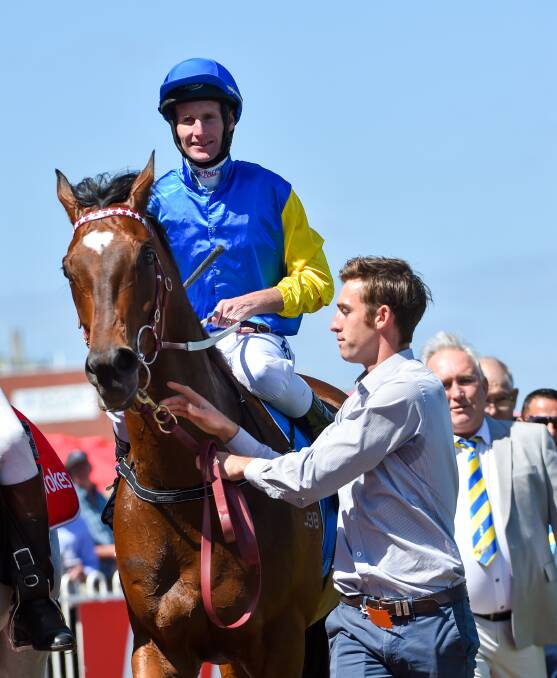 BIG HEART: Brad Rawiller and Black Heart Bart after taking out the group 1 Futurity Stakes at Caulfield. Picture: Getty Images