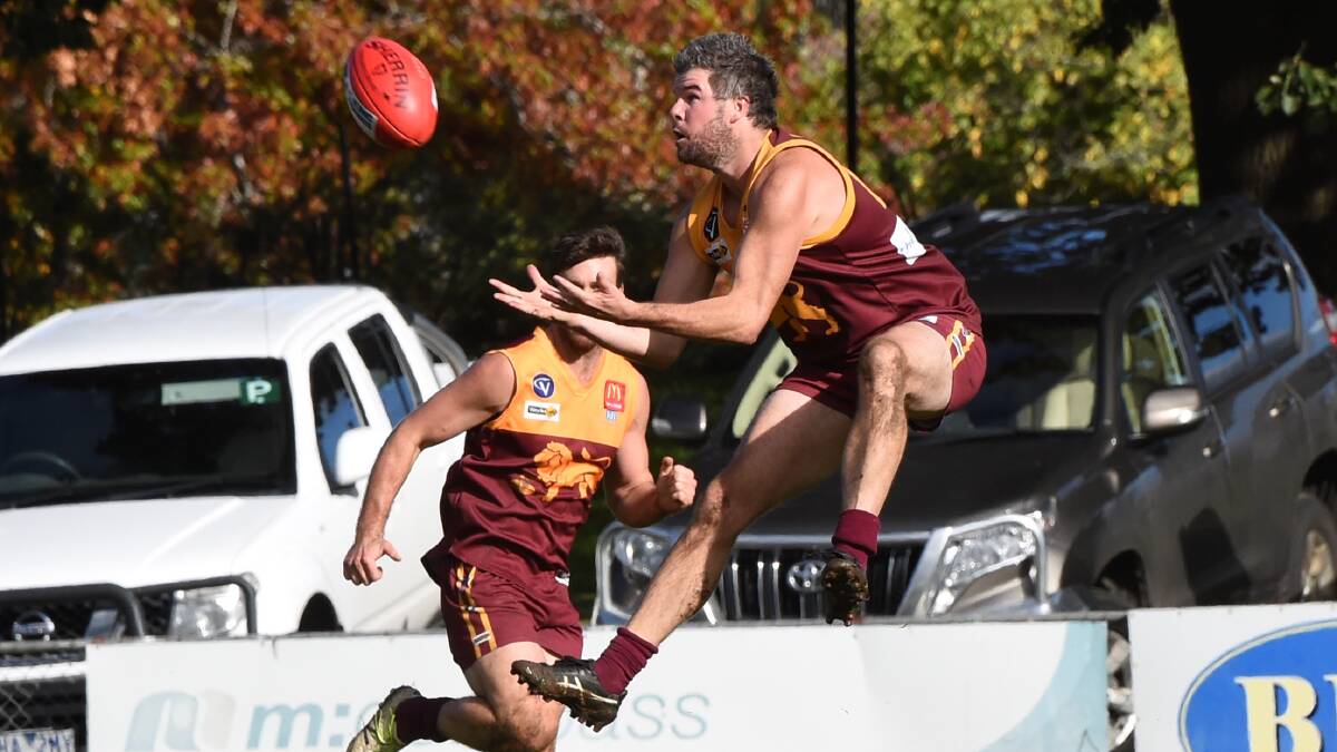 ON THE CHEST: Redan veteran Dean Chester had a day out for the Lions with four goals. Picture: Lachlan Bence 